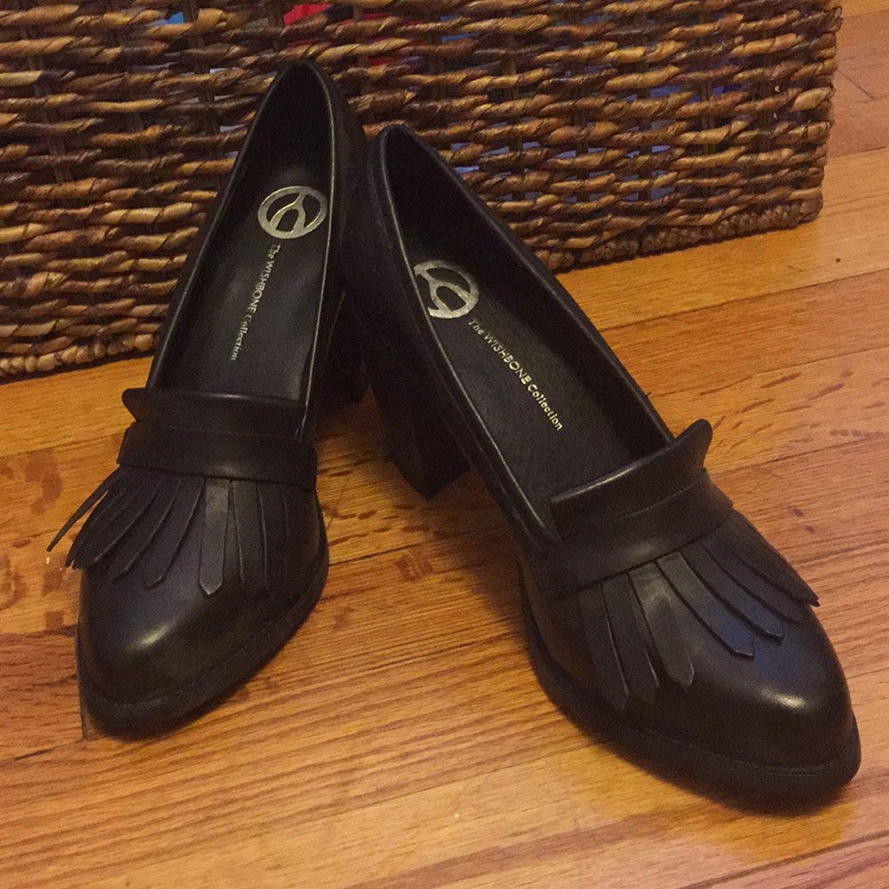 Black leather pumps